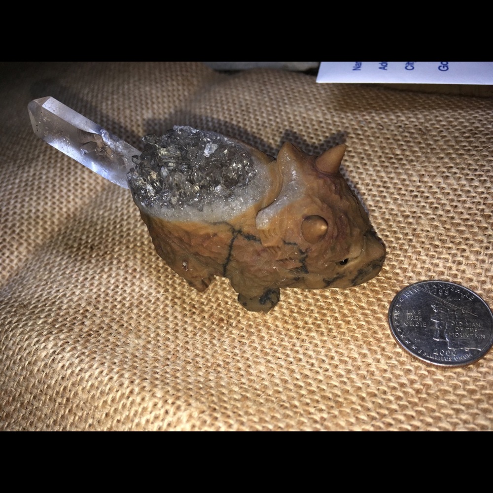 Hand carved quartz triceratops